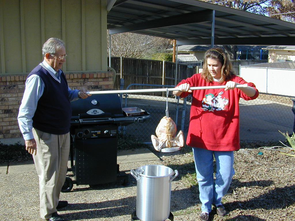 Dad & Scherre frying a turkey