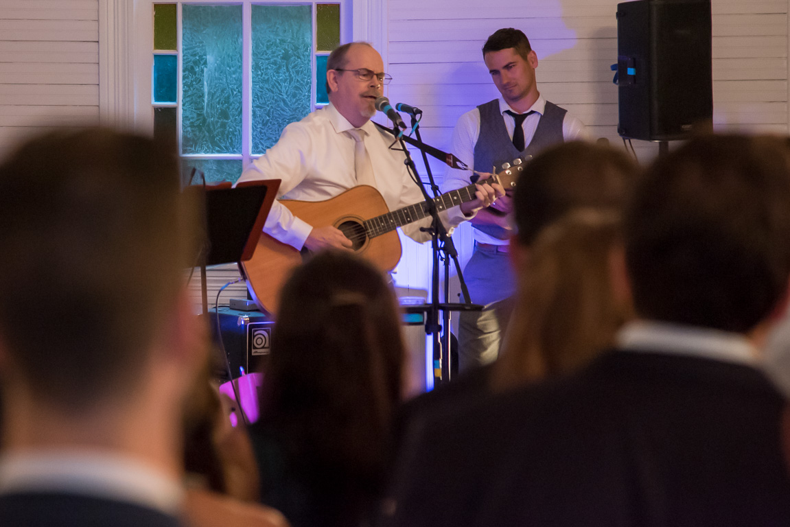 Henry singing at Abby's wedding